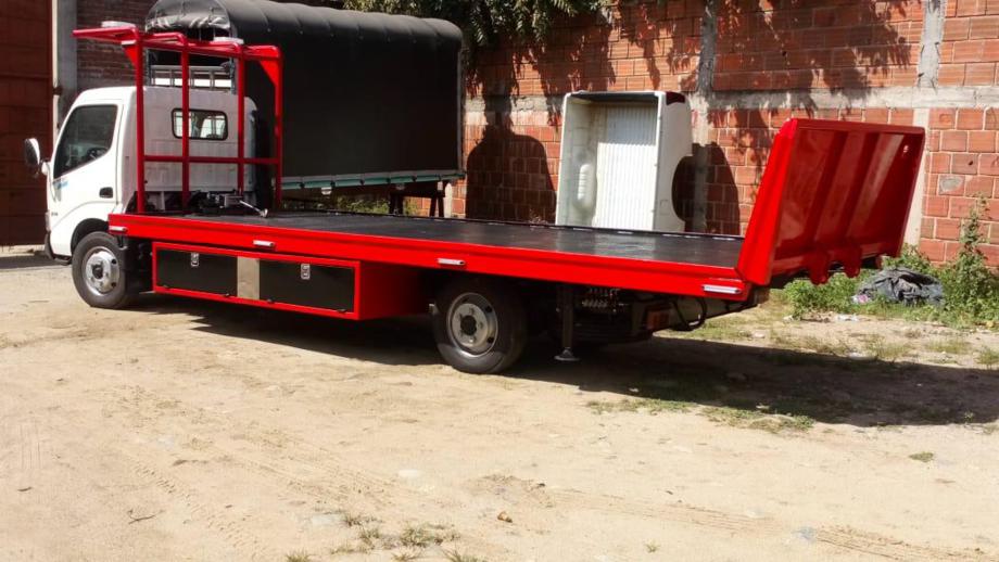 Transporte en tráiler planchón cama alta en Chihuahua, México